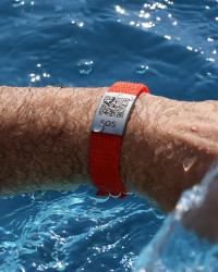 SOS textiel Noodarmband oranje